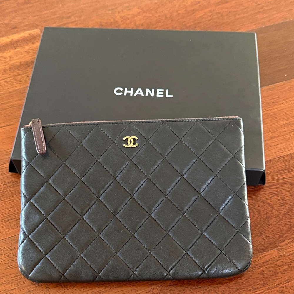 CHANEL AUTHENTIC Black Quilted Leather Pouch with Gold Logo